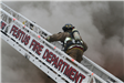 Fire fighter climbing the ladder