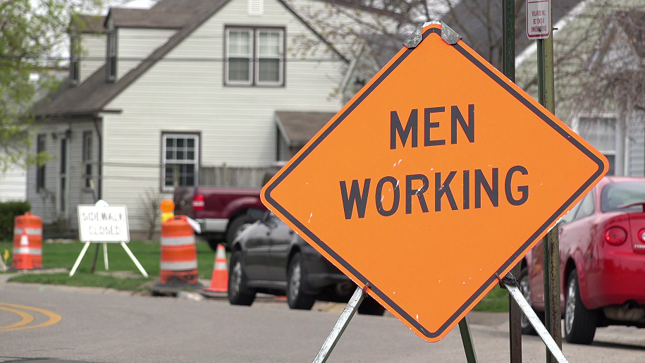men-working-sign
